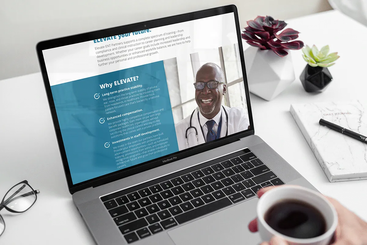 The Elevate Health landing page on a laptop.