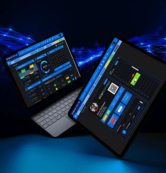 The GymRevenue admin console on a laptop and tablet.